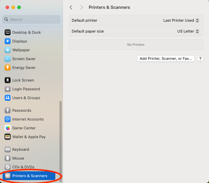 Screenshot of System preferences window highlighting to click on Printers and Scanners 